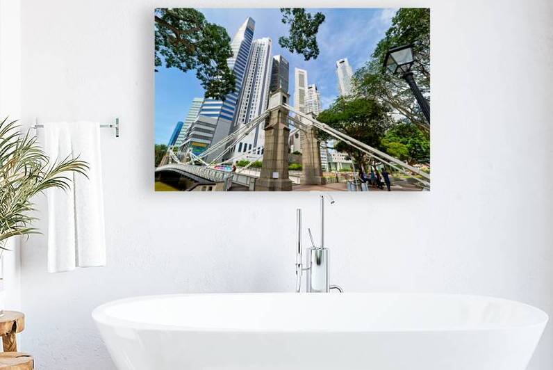 People walk across a bridge in Singapores financial area by Marco Brivio