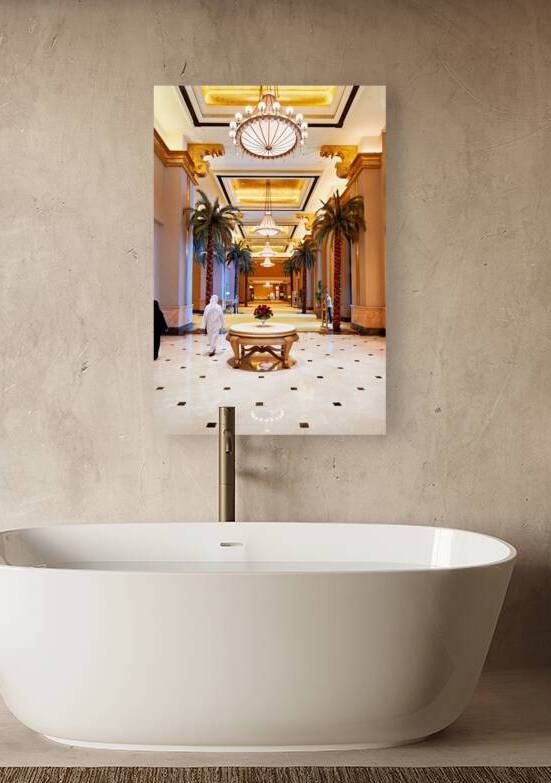 Visitors stroll through Emirates Palace Hotel lobby by Marco Brivio