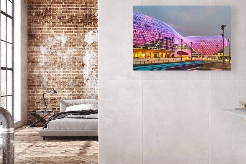 Illuminated W Abu Dhabi hotel on Yas Island at night by Marco Brivio