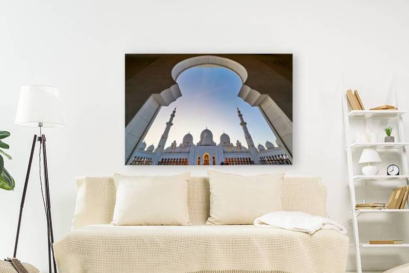 Sheikh Zayed Grand Mosque viewed from an arch at sunset by Marco Brivio