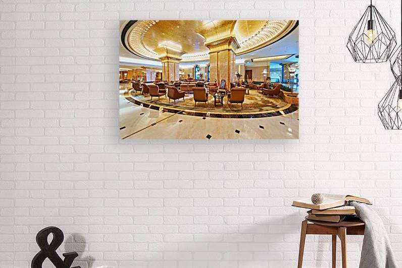 Tourists explore the lounge area at Emirates Palace Hotel by Marco Brivio