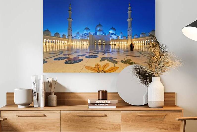 Visitors admire the beauty of Sheikh Zayed Grand Mosque at night by Marco Brivio