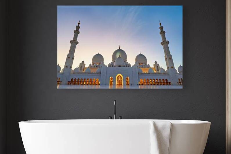 Illuminated Sheikh Zayed Grand Mosque during dusk in Abu Dhabi by Marco Brivio