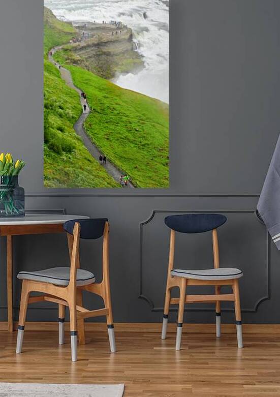 Visitors explore Gullfoss waterfall in Iceland on a cloudy day by Marco Brivio