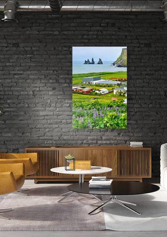 Coastline view of Reynisfjall and Vik town in Iceland by Marco Brivio