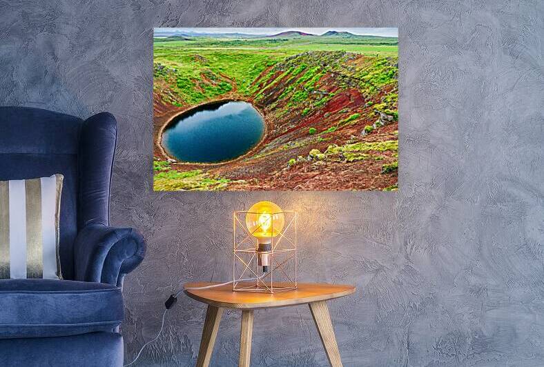 Kerid crater located in Iceland shows a round lake by Marco Brivio