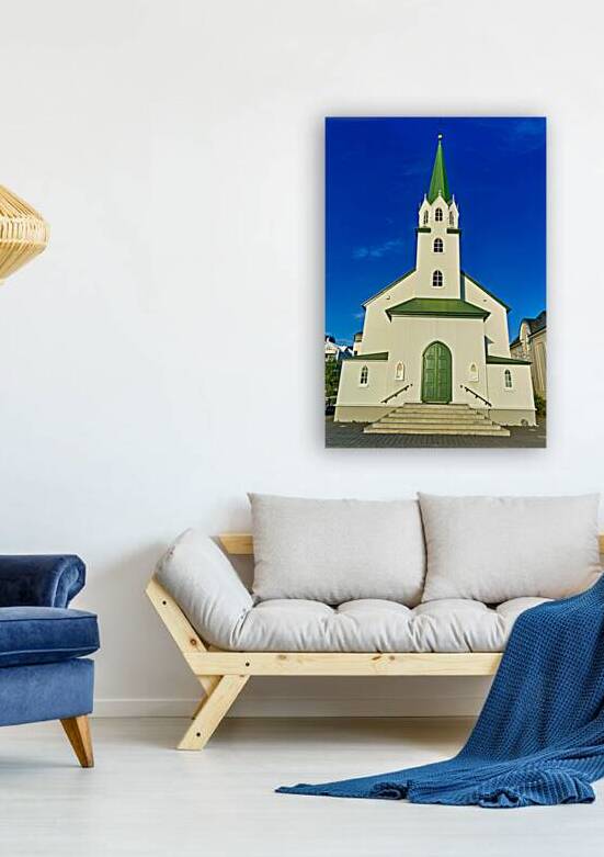 Lutheran Free Church in Reykjavik Iceland during sunset by Marco Brivio