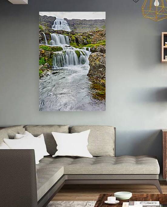 Gongumannafoss waterfall in Iceland with flowing water by Marco Brivio