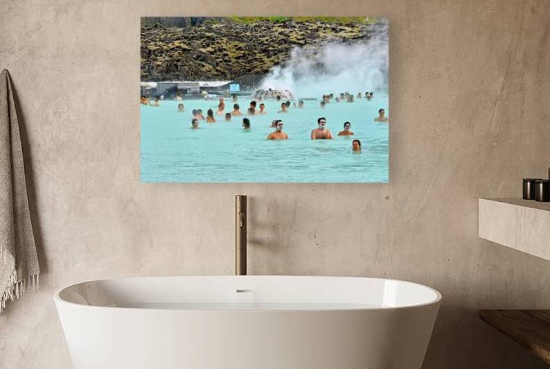 Visitors enjoy Grindaviks blue lagoon spa by day by Marco Brivio