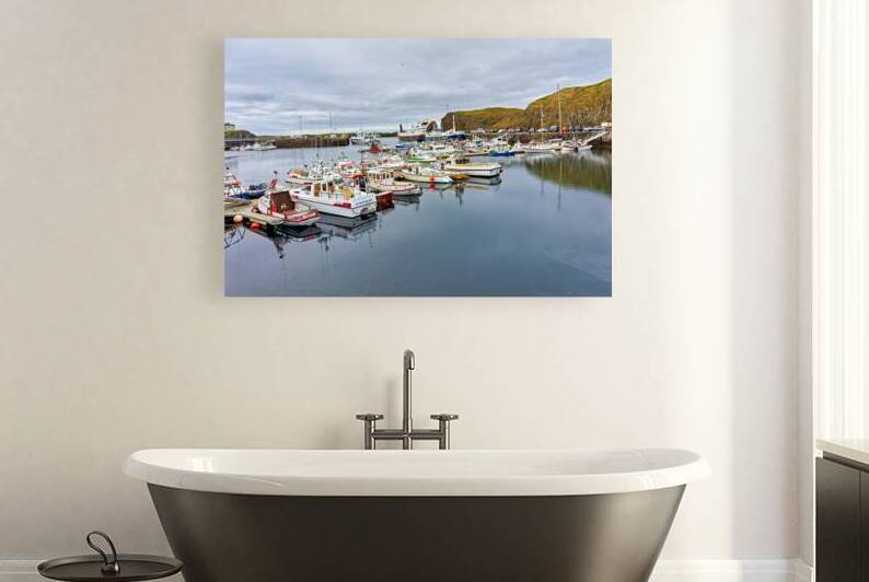 Fishing boats docked in Stykkisholmur harbor in Iceland by Marco Brivio