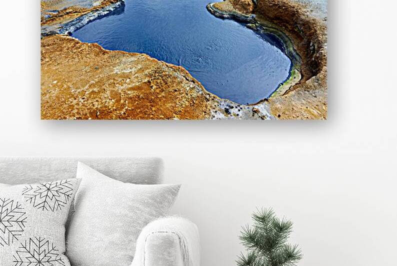 Exploring Hverir hot springs in Iceland during daytime by Marco Brivio