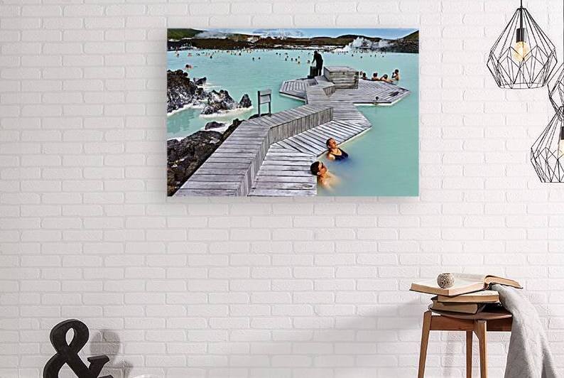 Visitors enjoy the thermal water at Blue Lagoon Spa in Iceland by Marco Brivio