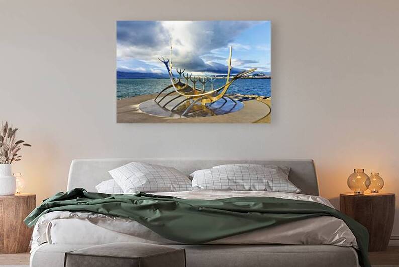 Sun Voyager sculpture in Reykjavik by the sea by Marco Brivio