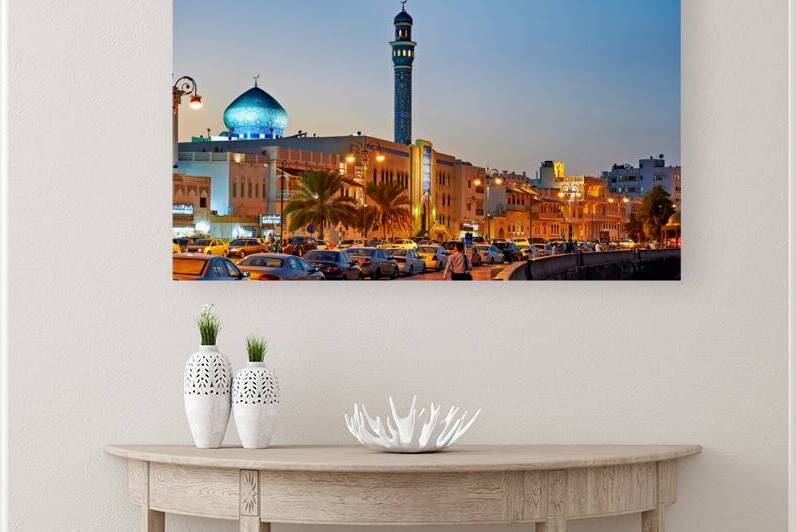 Waterfront cityscape of Muscat Oman at dusk by Marco Brivio