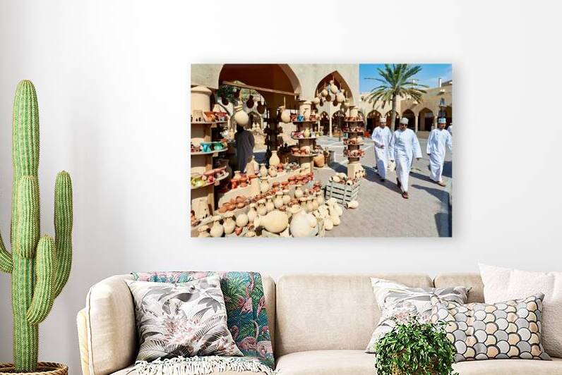 Visitors explore the market at Nizwa Oman during the day by Marco Brivio