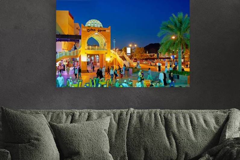 Waterfront view of Mutrah Souq in Muscat at sunset time by Marco Brivio