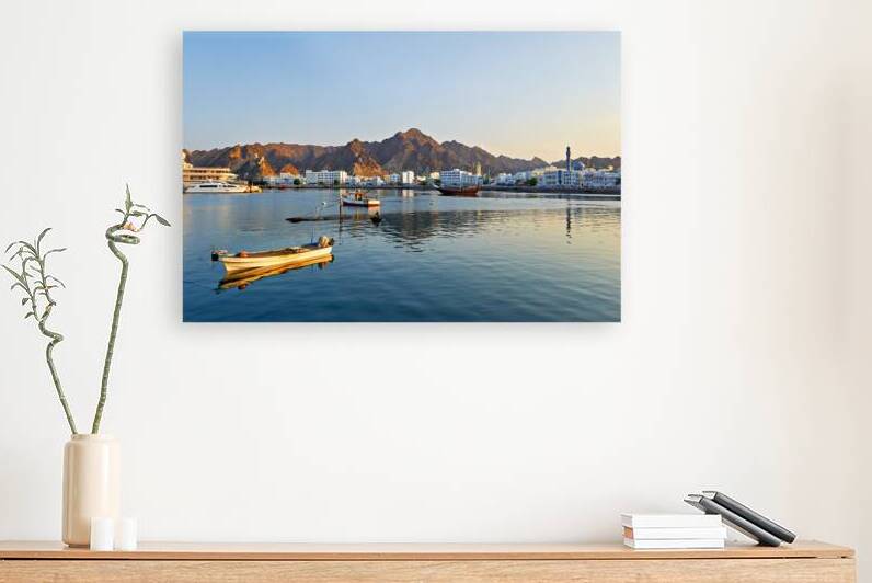 Waterfront view in Muscat Oman at sunset near boats by Marco Brivio