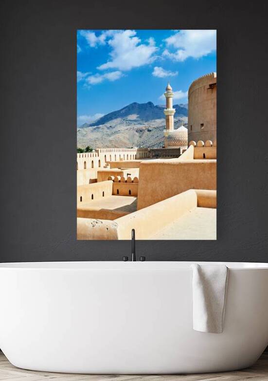 Nizwa Fort view with mountains and mosque in Oman by Marco Brivio