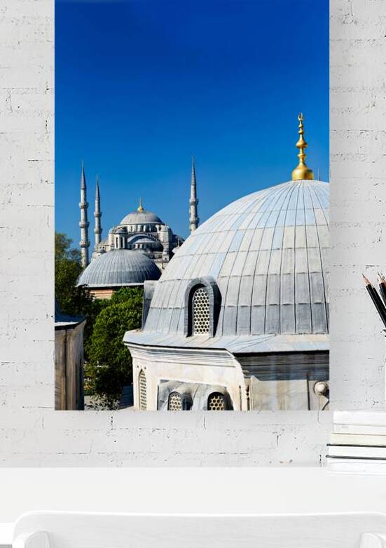 Blue Mosque stands tall in Istanbul under the clear sky by Marco Brivio
