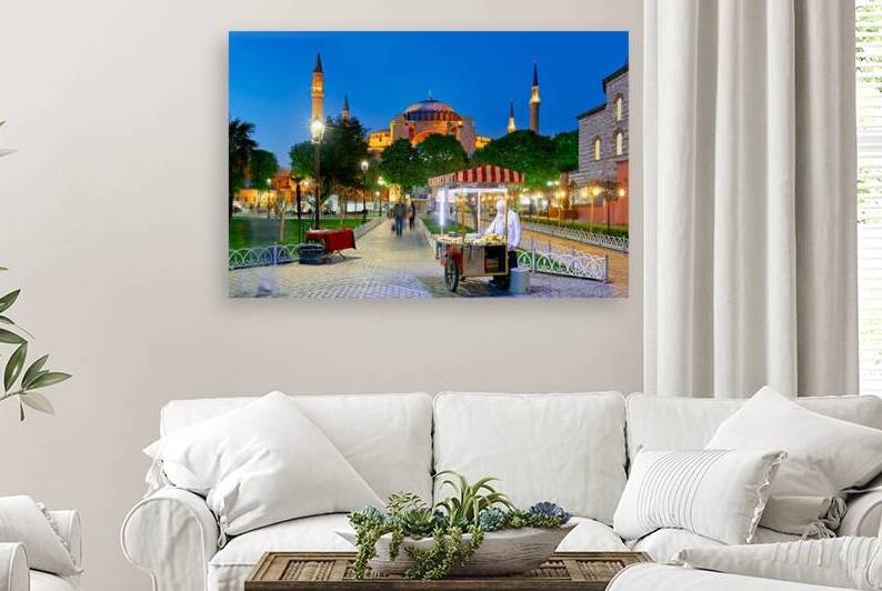 Hagia Sophia Grand Mosque at night with local vendor by Marco Brivio
