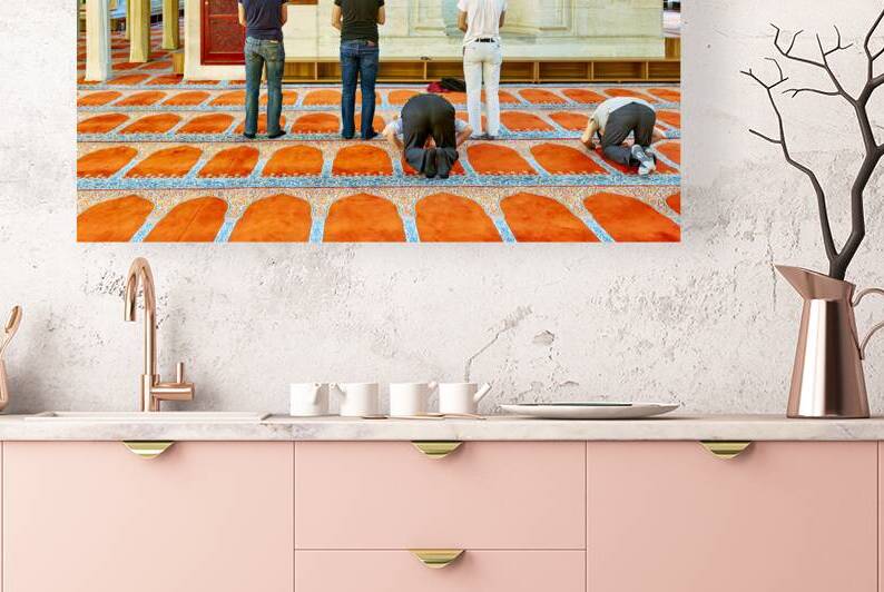 People pray inside Suleymaniye Mosque in Istanbul Turkey by Marco Brivio