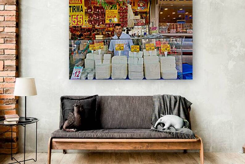 Cheese vendor at Grand Bazaar in Istanbul during busy hours by Marco Brivio