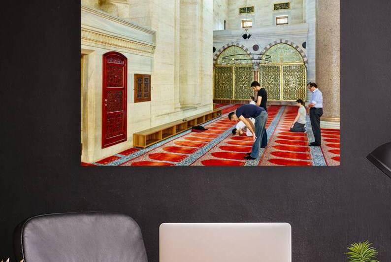 People pray inside Suleymaniye Mosque in Istanbul Turkey by Marco Brivio