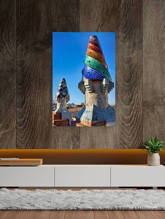 Exploring Palau Guell with colorful chimneys in Barcelona by Marco Brivio