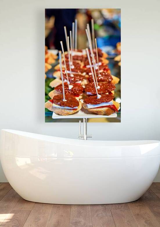 Enjoying tasty tapas in a bar in Barcelona Spain by Marco Brivio