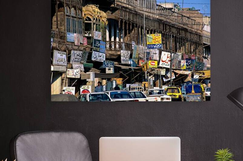 Streets in Peshawar with shops and vehicles by Marco Brivio