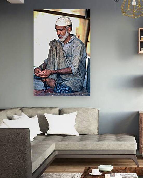 Butcher works with knife in Mingora Pakistan during day by Marco Brivio