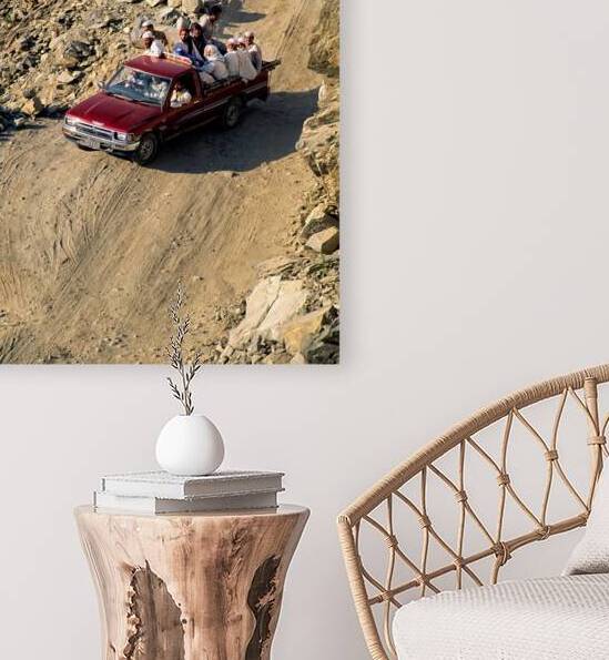 Travelers on gravel road near Shandur Pass in Pakistan by Marco Brivio