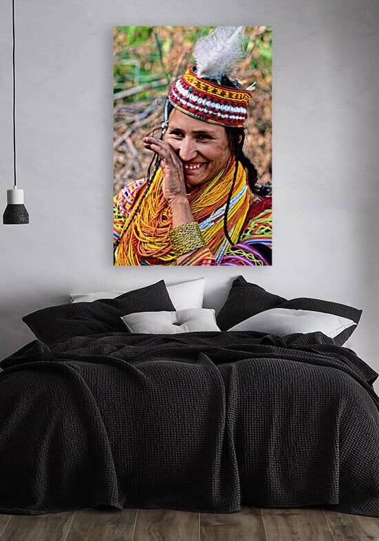 Kalash woman smiles at a cultural event in Pakistan by Marco Brivio