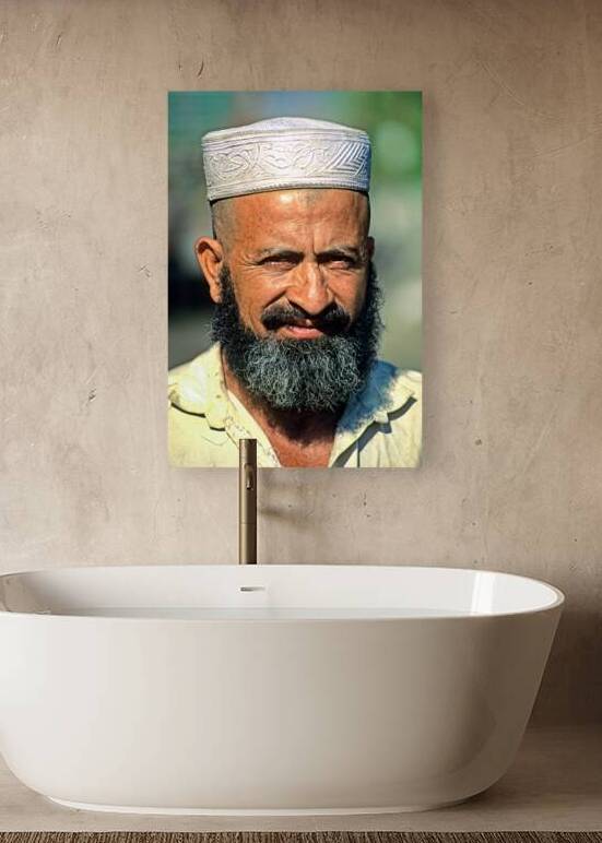 Portrait of a bearded man in Pakistan during daylight by Marco Brivio