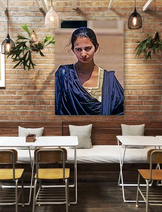 Portrait of a woman standing in Lahore on a sunny day by Marco Brivio