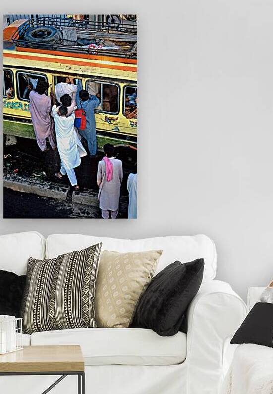 People boarding a bus in Lahore during busy hours by Marco Brivio