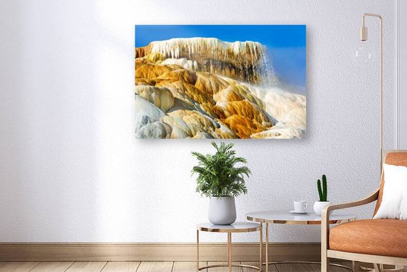 Steam rises from Devils Thumb in Yellowstone National Park by Marco Brivio