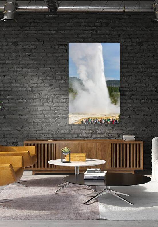 Tourists watch Old Faithful Geyser erupt in Yellowstone Park by Marco Brivio