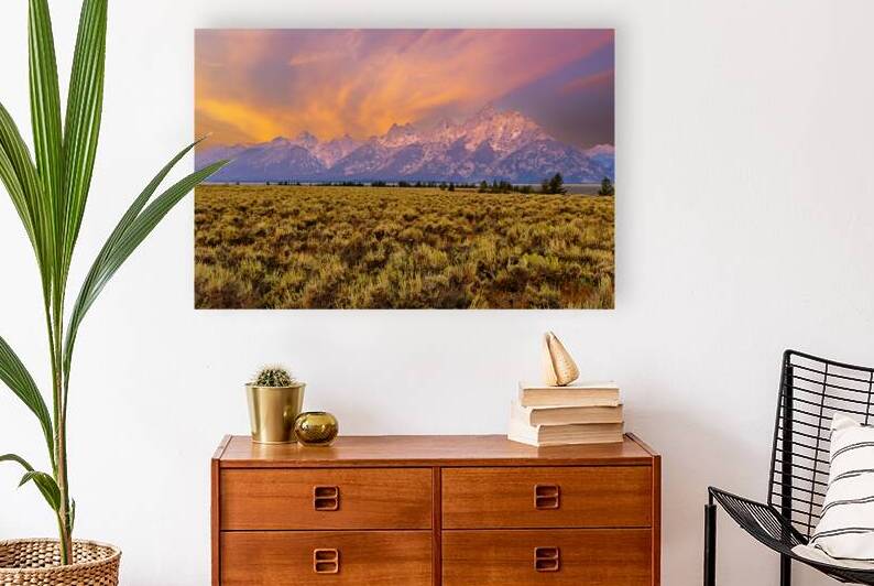 Hikers explore view of Grand Teton mountains at sunset by Marco Brivio