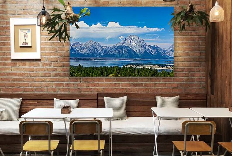 Mountains and lake in Grand Teton National Park during day by Marco Brivio