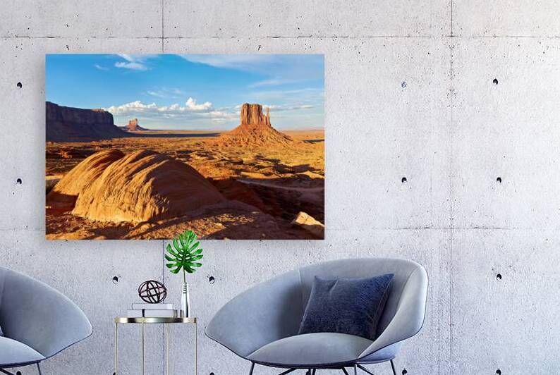 Monument Valley shows its vast red landscape in daylight by Marco Brivio