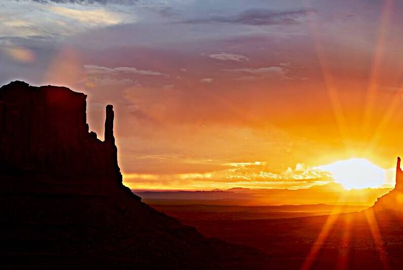 Sunset over monument valley in navajo nation by Marco Brivio