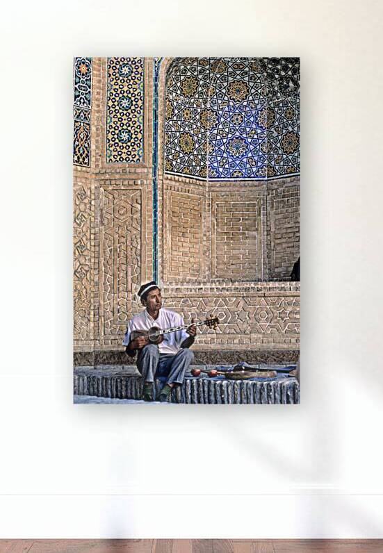 Musician plays traditional instrument in Bukhara Uzbekistan by Marco Brivio
