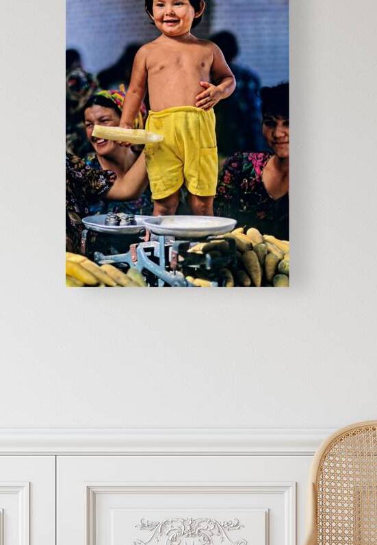 Kid stands at vegetable market in Samarkand Uzbekistan by Marco Brivio