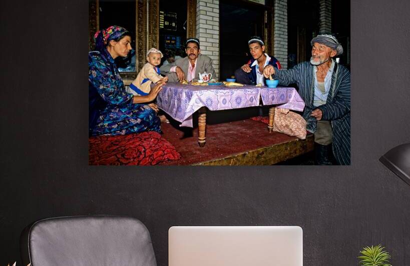 Family enjoys traditional dinner in Samarkand Uzbekistan by Marco Brivio
