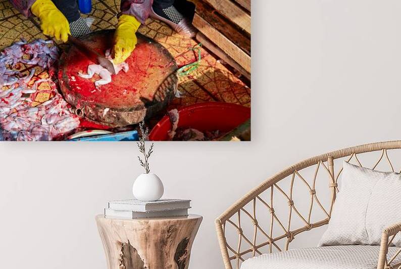 Fresh fish preparation at market in Hanoi during midday by Marco Brivio