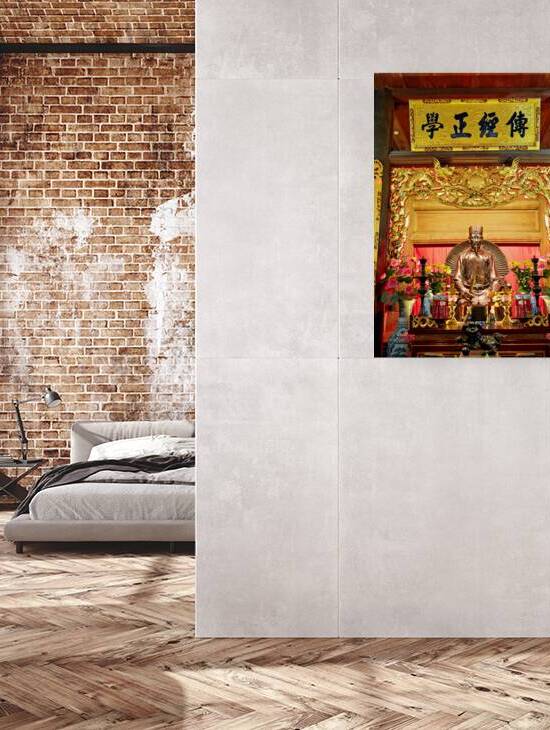 Statue and altar displayed in a temple in Hanoi Vietnam by Marco Brivio