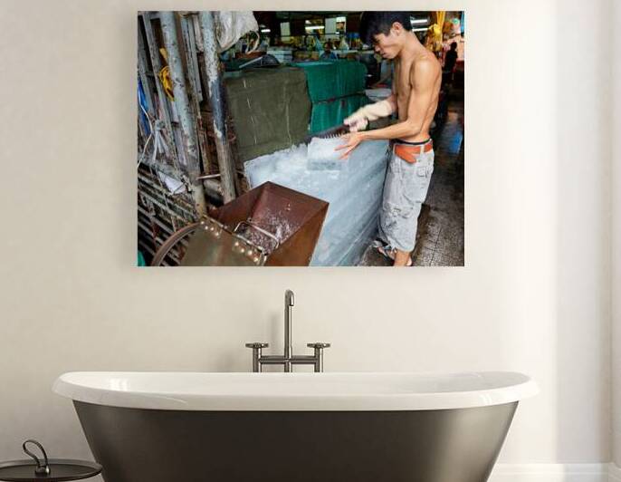 Ice cutting at a market in Ho Chi Minh City Vietnam by Marco Brivio