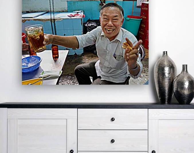 Man enjoying drink and food at cafe in Ho Chi Minh City by Marco Brivio