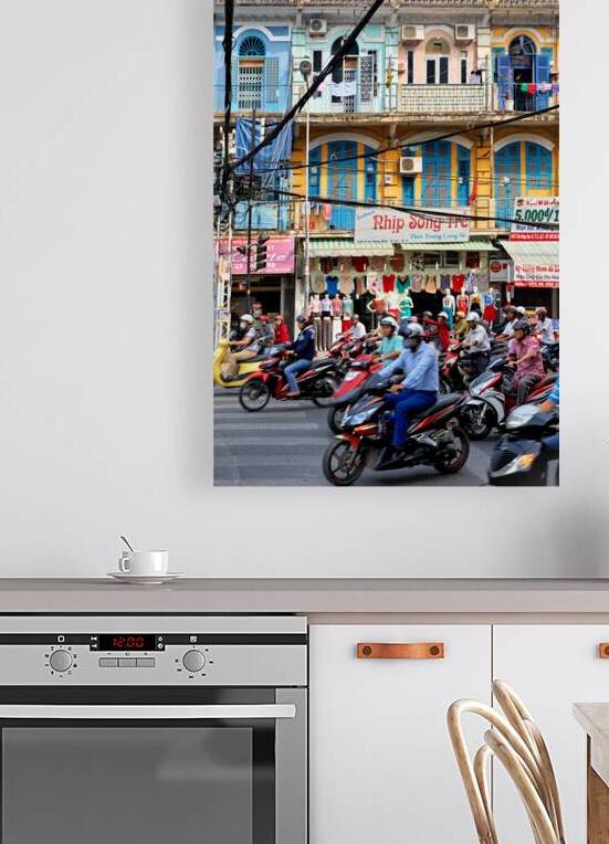 Traffic in Ho Chi Minh City with shops in the background by Marco Brivio